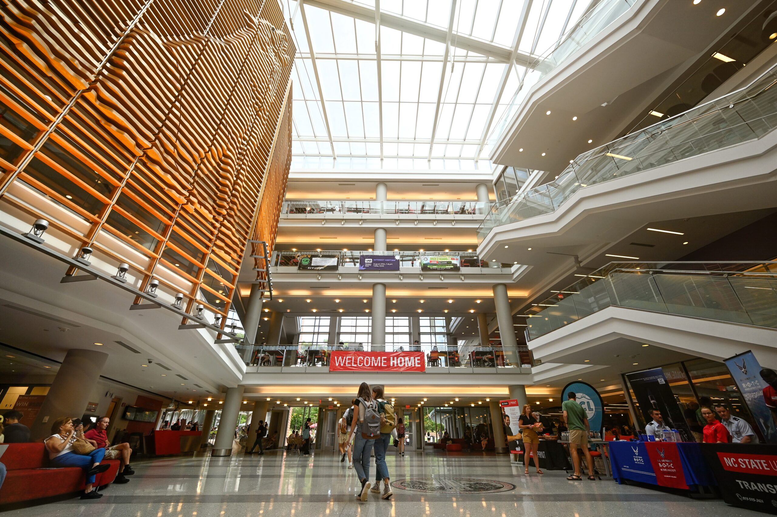 The interior of the Talley Student Union, which is displaying a large "Welcome Home" banner.
