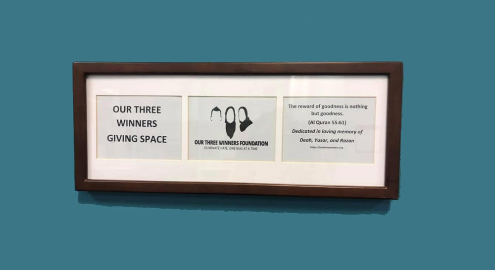 Our Three Winners Giving Space memorial plaque