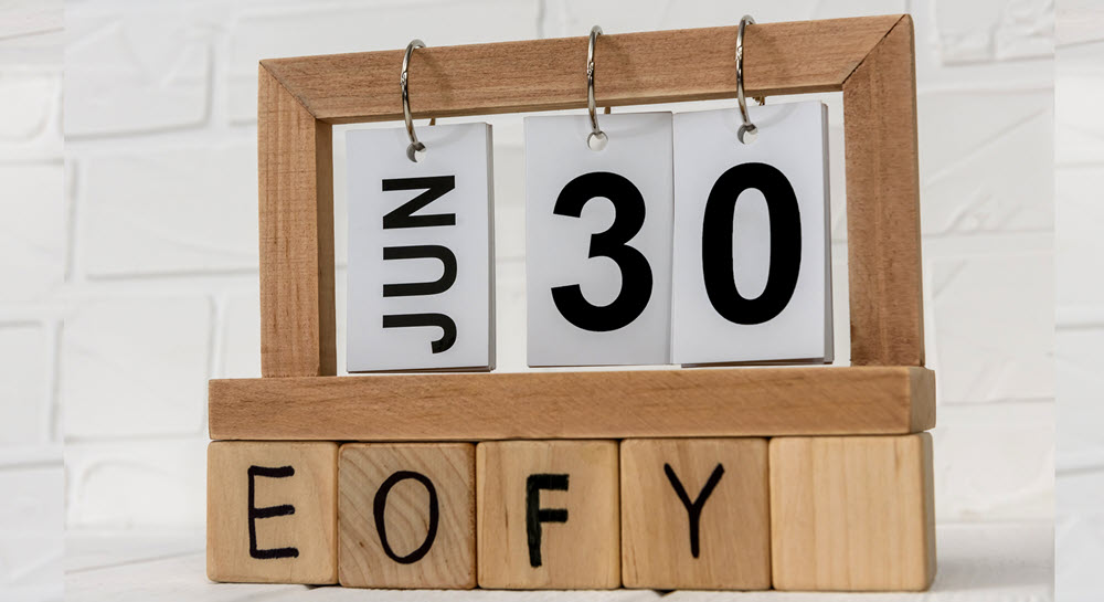 A flip calendar showinng June 30 with "EOFY" (End of Fiscal Year) in blocks underneath