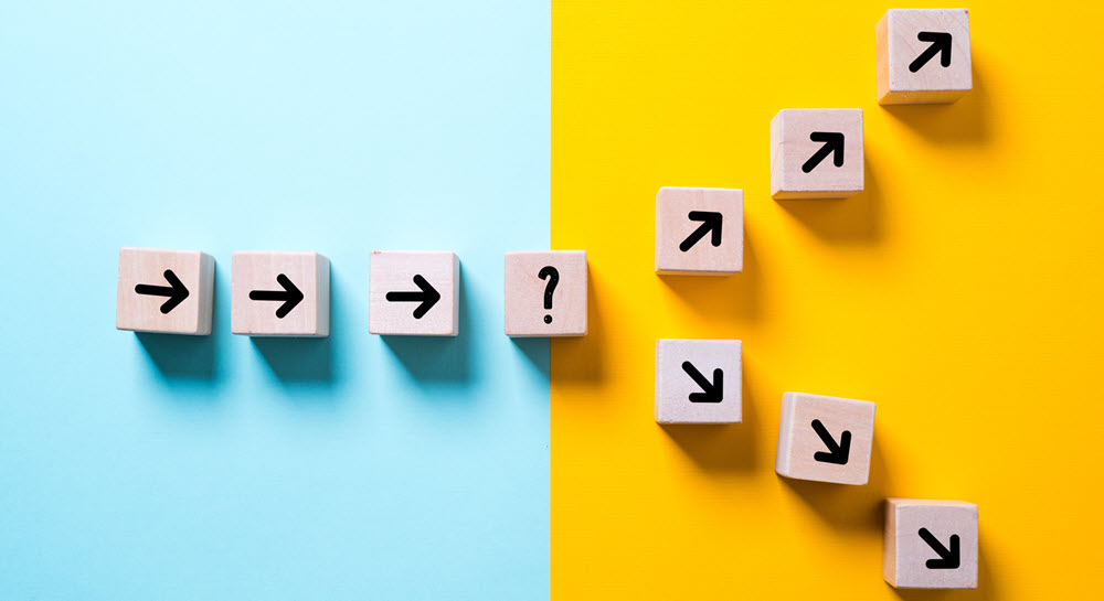 One path of arrow blockss ending in a question mark and then splitting into two paths of arrow blocks